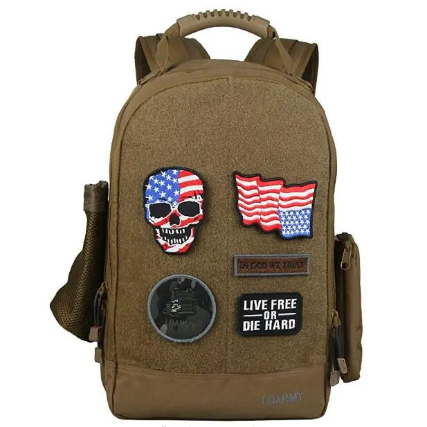 Coyote brown backpack with American flag, skull, and "Live Free or Die Hard" patches.