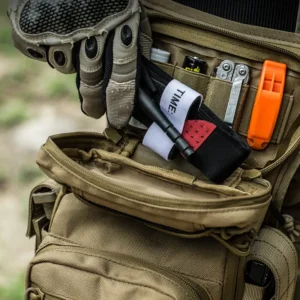 Tan tactical leg bag in use