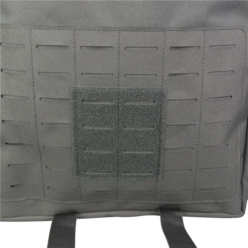 gray tactical backpack with velcro patches and laser cut molle