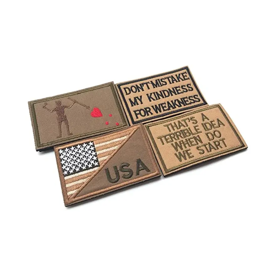 Four morale patches with hook backing