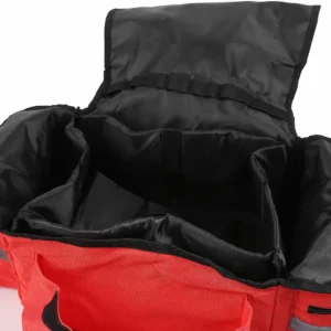 punainen ensiapulaukku, jossa on verkkotaskut ja välitaskuja